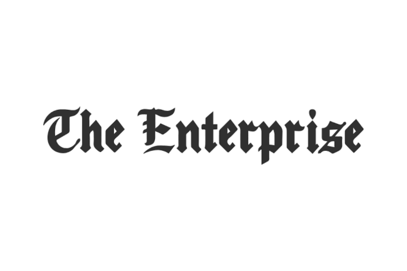 The words "The Enterprise" are written in black, Gothic-style font on a white background.